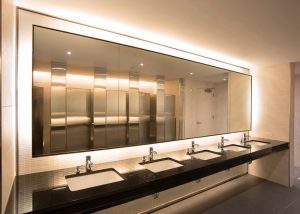 gleaming-commercial-bathroom-with-row-of-sinks